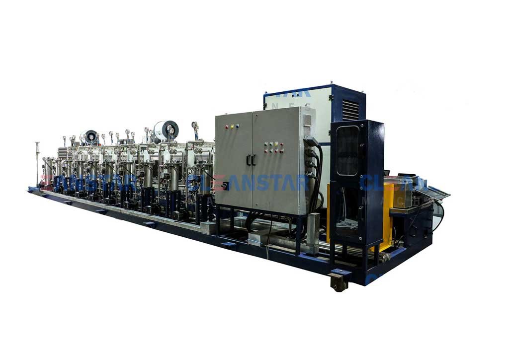 front view of multistage conveyor type component washing machine